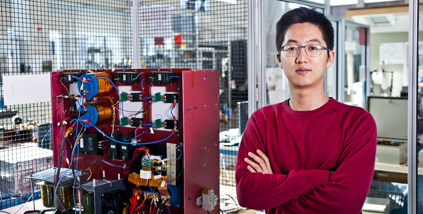 Confident man in engineering lab