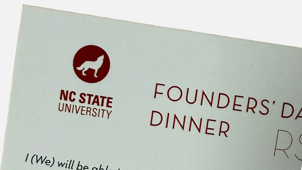 A circle wolf at the top of letterhead.