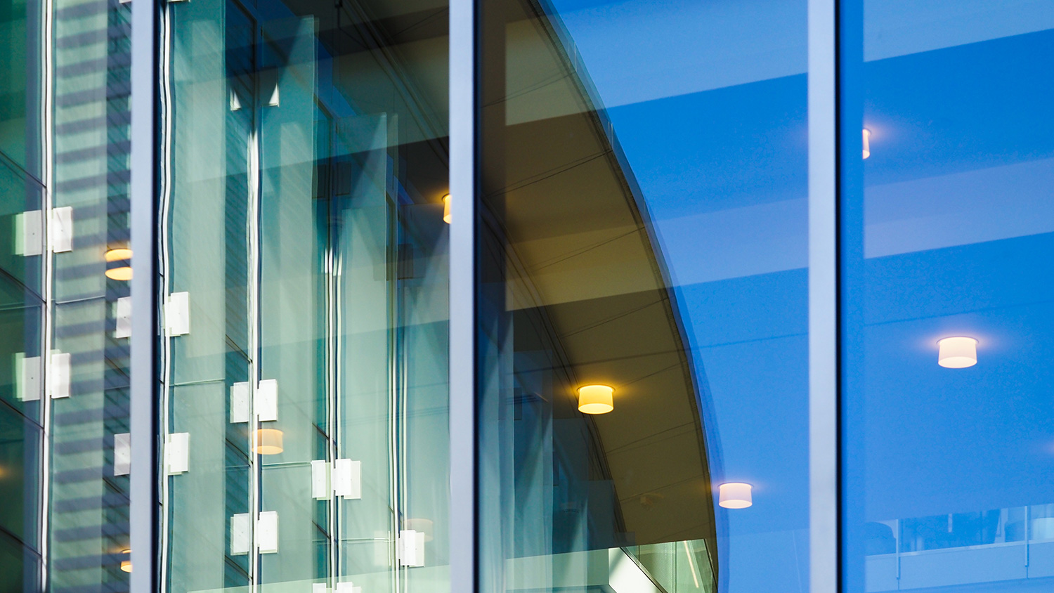 The reflection of Talley Student Union in a window.